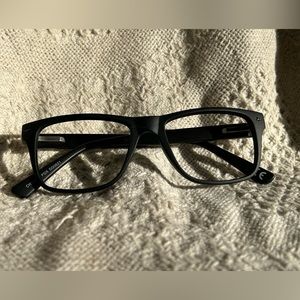 Plastic frame. New w demo lenses and spring hinges. Brand new Eyeglasses